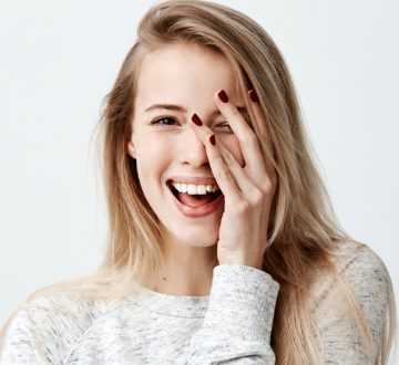 Benefits of Dental Implants Over Dentures and Bridges